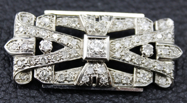 (image for) A 18K WHITE GOLD ANTIQUE DIAMOND BROOCH